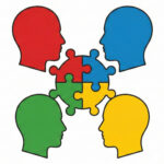 A diagram shows four stylized human head profiles, colored red, blue, yellow, and green, facing a central cluster of four interlocking puzzle pieces of the same respective colors. The puzzle pieces are joined together in the middle, symbolizing collaboration or the combination of different parts to form a whole.